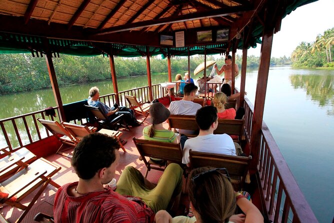 8 Days Kerala Tour Package with Houseboat Stay - The road to Munnar: waterfalls, spice stops, and tea-country air