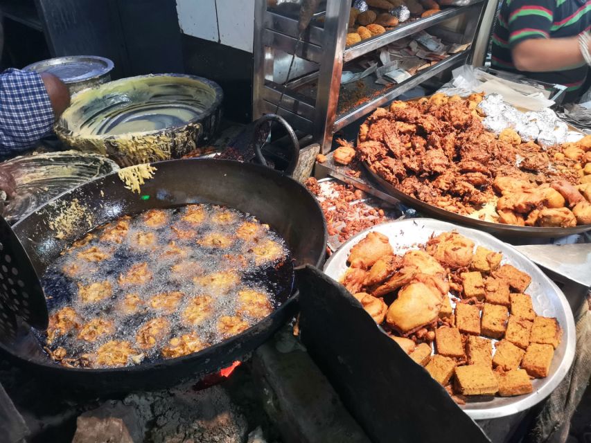 Bengali Nights Kolkata Food Tour with 13+ Tastings - College Street food culture: book sellers, then coconut sherbet and sweets