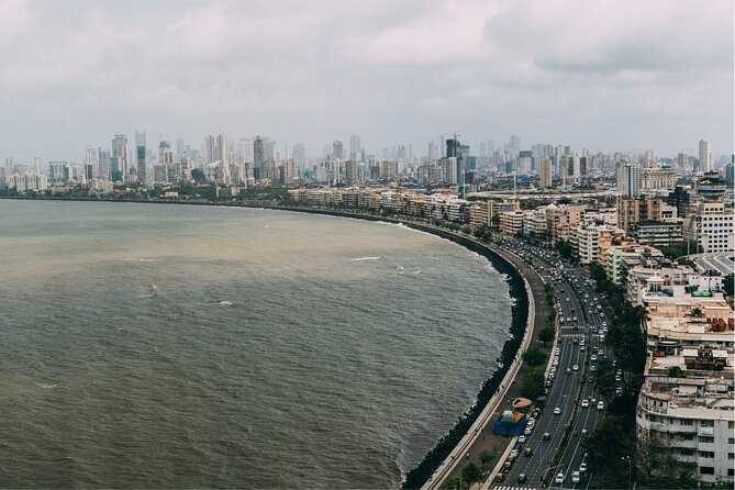 Cultural & Heritage Trails of Old Town Mumbai Guided Walking Tour - Royal Bombay Yacht Club and the Cinema Stop That Breaks the Mold