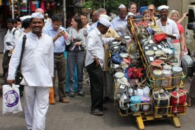 Dabbawala, Dhobi Ghat & Dharavi slum Tour with Local Train Ride