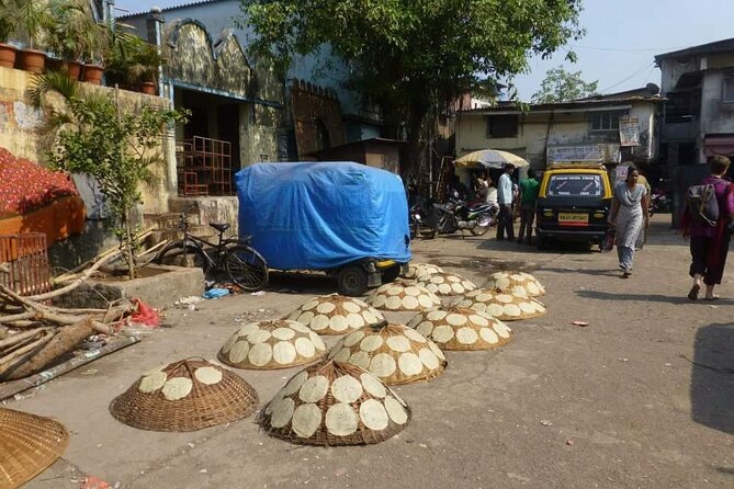 Dharavi Slum Tour - Stop 1 in Dharavi: narrow lanes and real trades