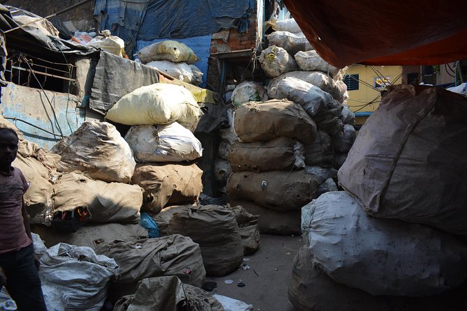 Dharavi slum tour in Mumbai by Female tour guides of the slum - Stop 2: A short Magical Mumbai Tours segment and what it likely means