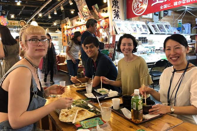 Experience the energy of Kochi: Sunday Market Tour includes Kochi Castle - Stop 2: Hirome Ichiba food hall, katsuo no tataki, and easy shopping rhythm