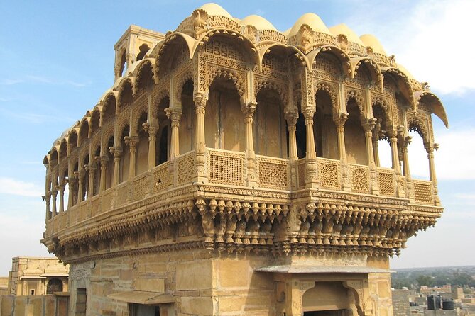 Fascinating Day Tour of Golden City Jaisalmer - Nathmal Ji Ki Haveli: ornate carvings in a small lane world