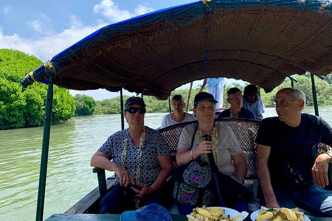 Flavors of North Kerala - Malabar Experiential Tour Package - Edakkal Caves trekking, Wayanad village visits, and archery practice