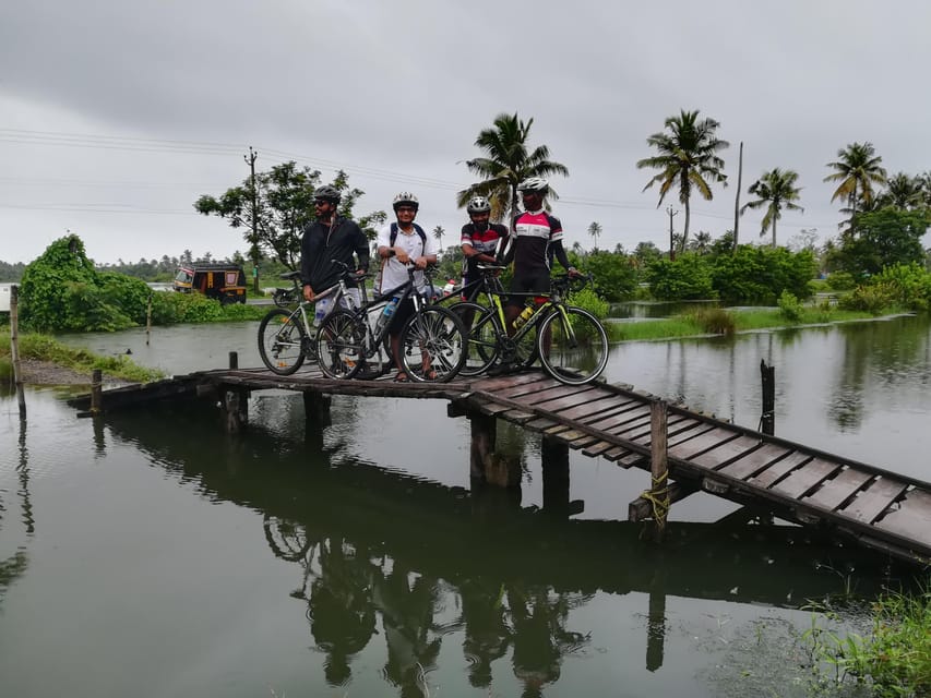 Fort Kochi Beach and Backwater eBike/Cycling Tour (Half Day) - Riding the narrow sandbank roads between shrimp farms