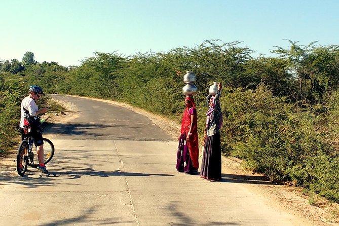 Morning Bike Tour of Udaipur - Bike, Helmet, and the Guide Team You Rely On