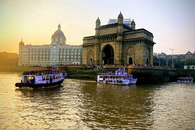 Mumbai City Sightseeing and Elephanta Caves Tour - Mani Bhavan, Taj Mahal Palace, and the University library stops