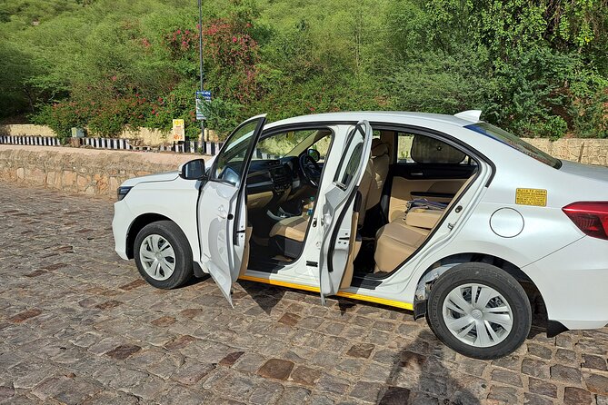 Private Jaipur Arrival Transfer - Airport to Hotel/Accommodation - The car, AC comfort, and the small included perks