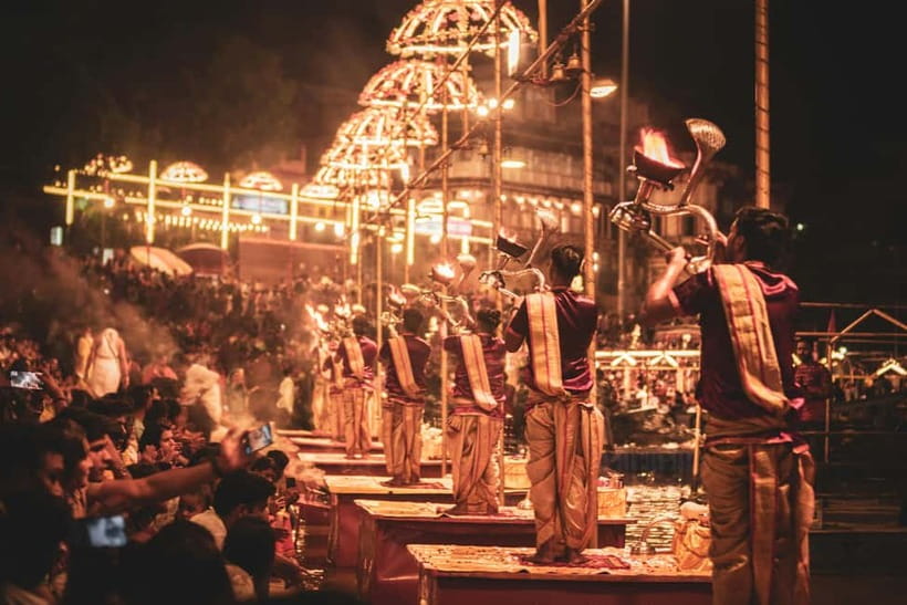 Varanasi Landmark Evening City Tour - Aarti & Boating - The Aarti moment from the boat: calmer viewing, bigger impact